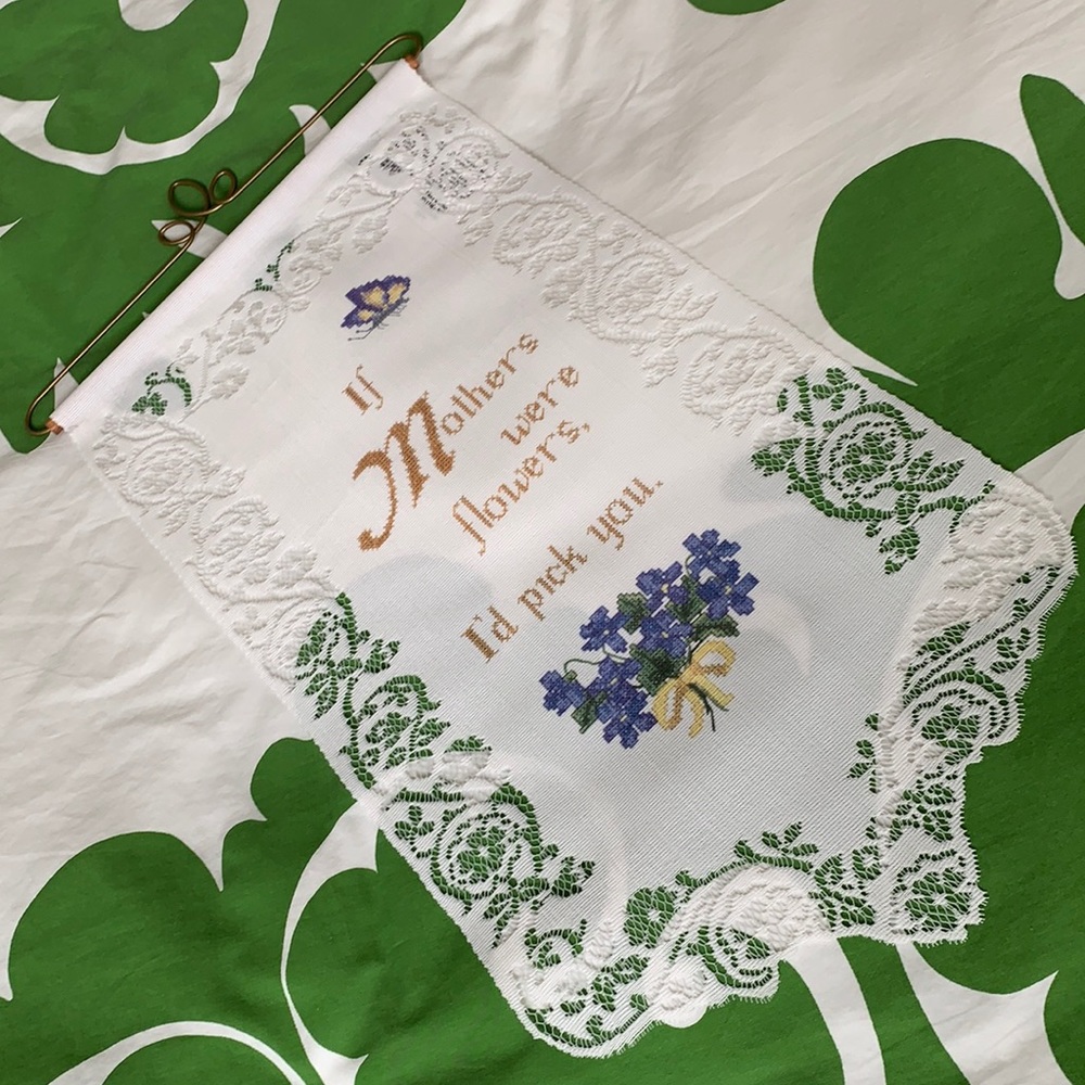 Wall banner with flowers, butterflies, and ode to mothers